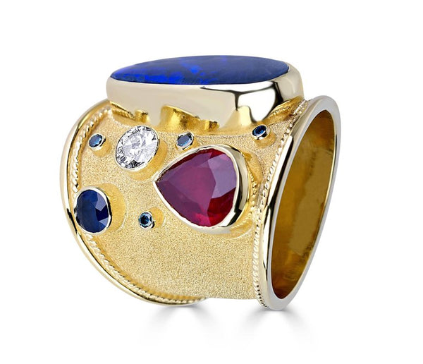 18 Karat Gold Ring with Opal Ruby Sapphire and Blue Diamond