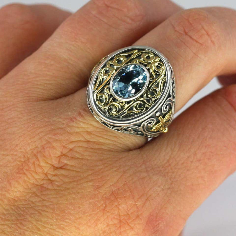18 Karat Gold and Silver Ring with Blue Topaz