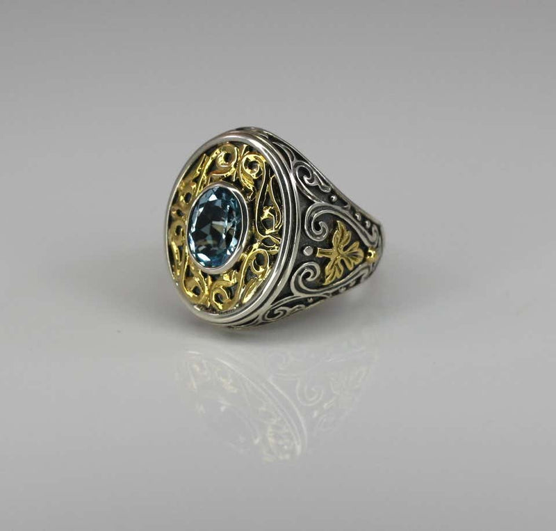 18 Karat Gold and Silver Ring with Blue Topaz