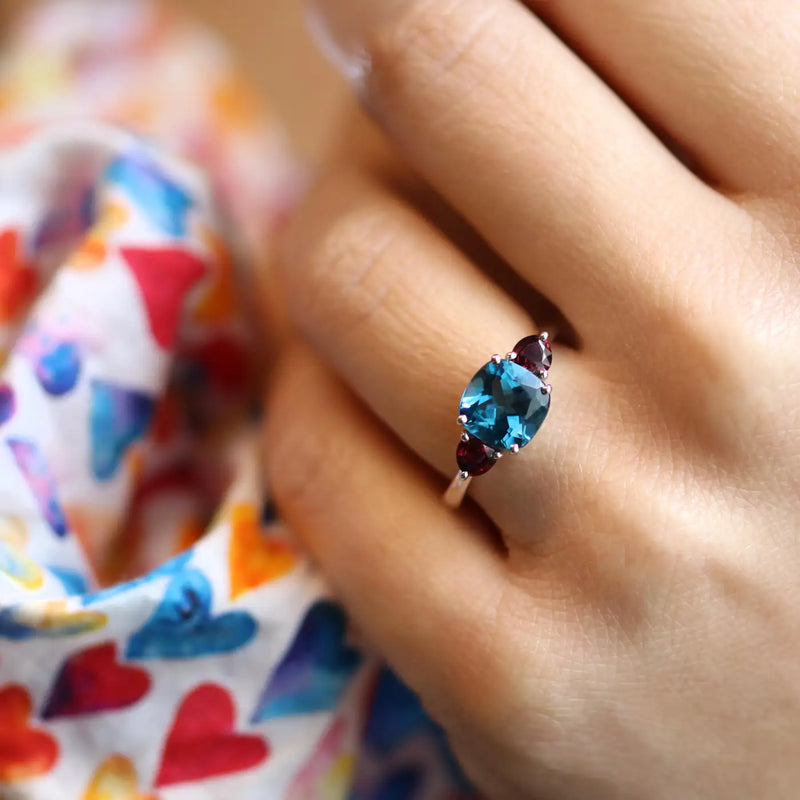 Georgios Collections 18 Karat White Blue Topaz Cushion Ring with Rubies