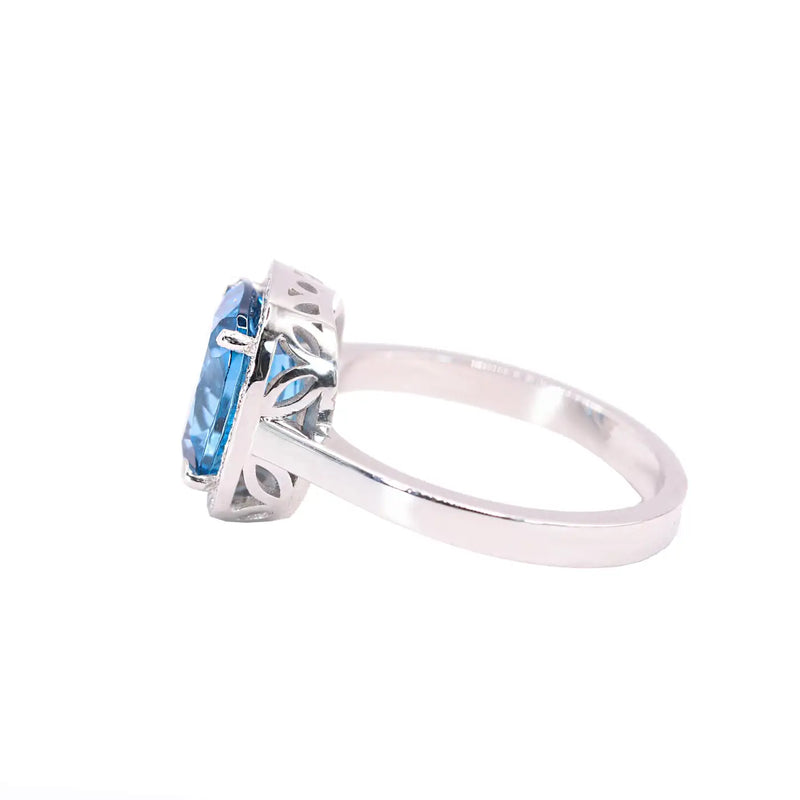 Georgios Collections 18 Karat White Gold Blue Topaz Ring with Diamond Bezel