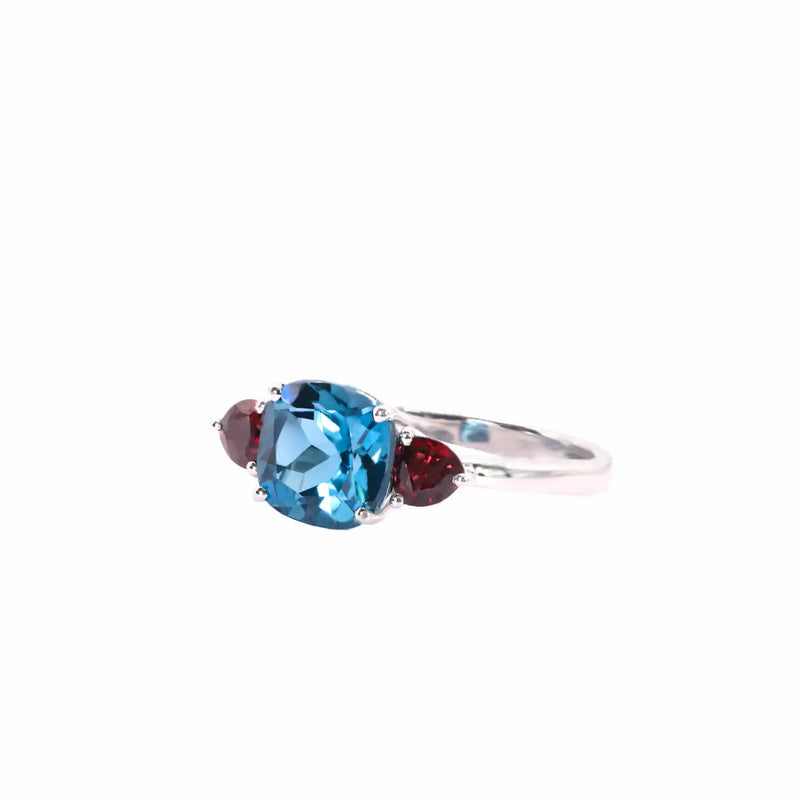 Georgios Collections 18 Karat White Blue Topaz Cushion Ring with Rubies