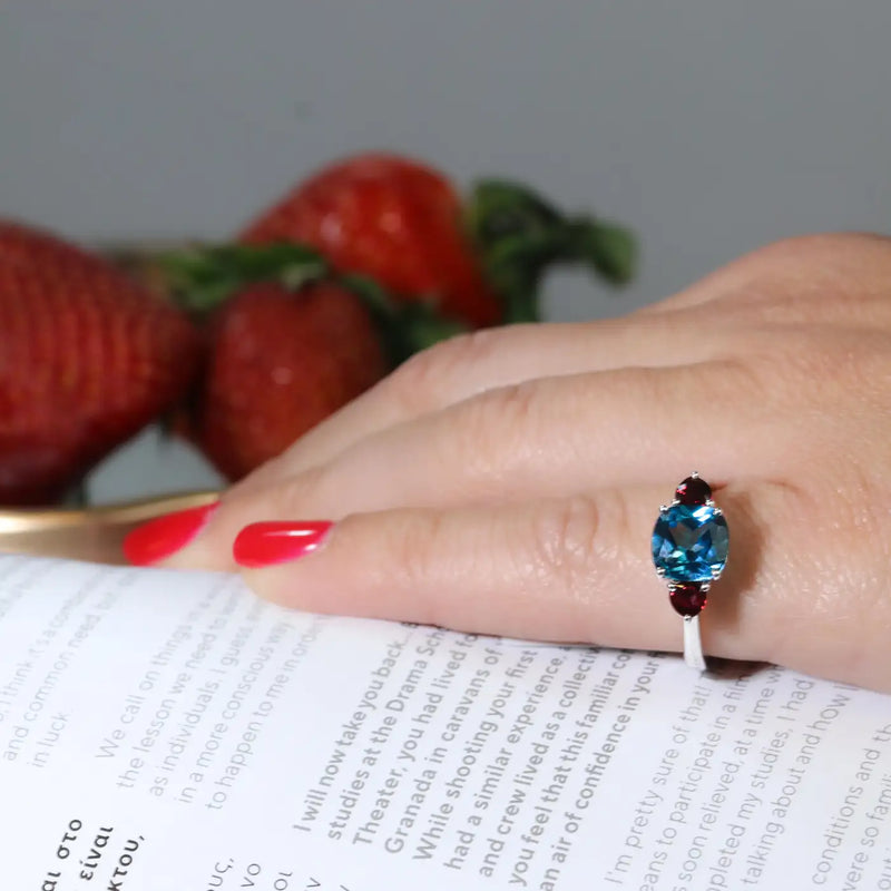 Georgios Collections 18 Karat White Blue Topaz Cushion Ring with Rubies
