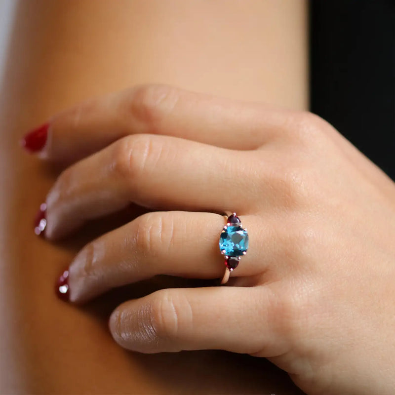 Georgios Collections 18 Karat White Blue Topaz Cushion Ring with Rubies