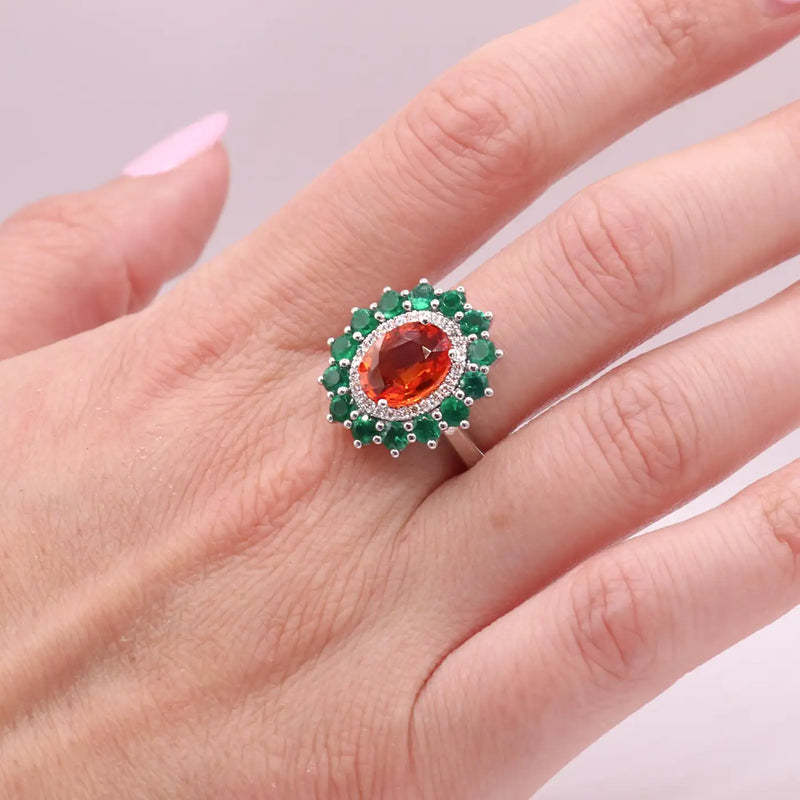 Georgios Collections 18 Karat White Gold Orange Sapphire and Emeralds Ring