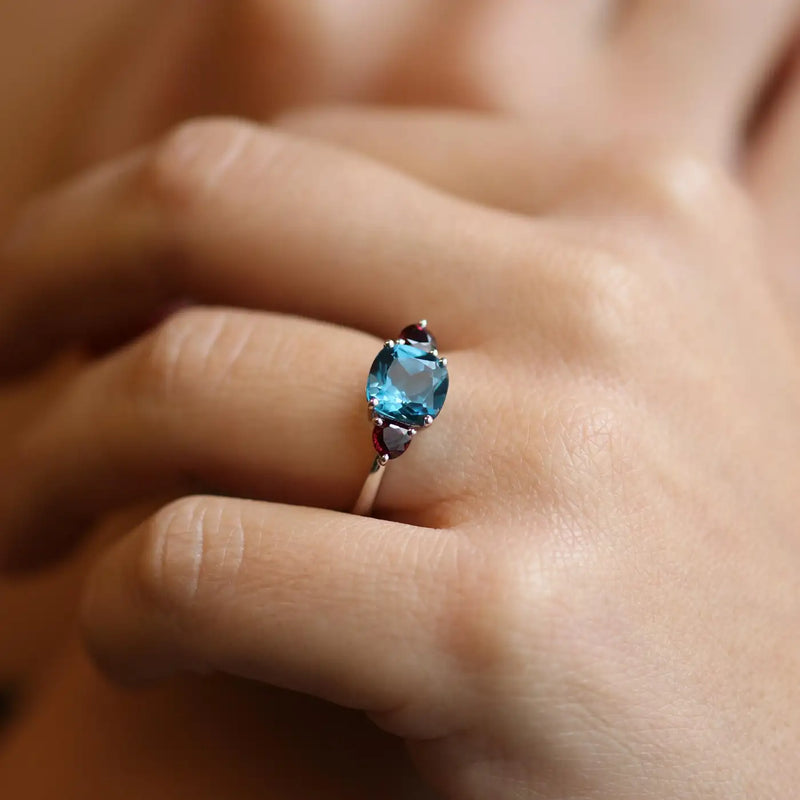 Georgios Collections 18 Karat White Blue Topaz Cushion Ring with Rubies