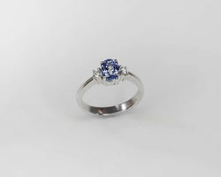 18 Karat White Gold Oval Natural Sapphire and Diamond Ring