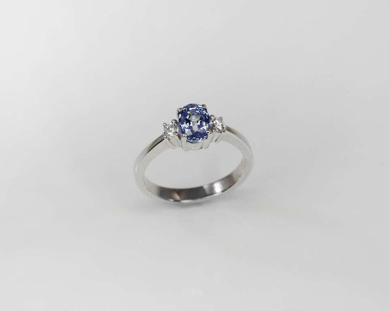 18 Karat White Gold Oval Natural Sapphire and Diamond Ring