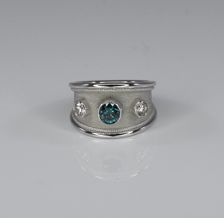 18 Karat White Gold Ring with Blue and White Diamonds