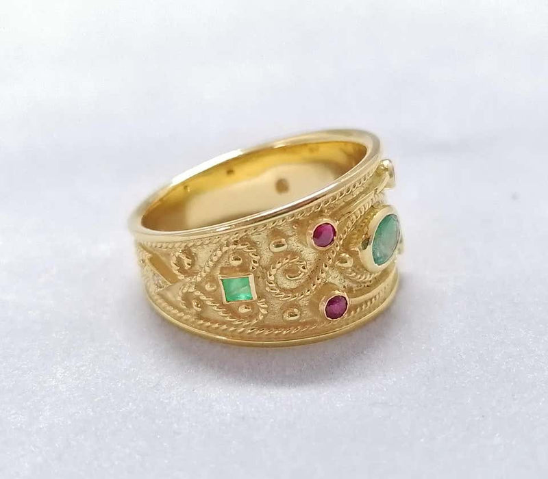18 Karat Yellow Gold Diamond Emerald and Ruby Band Ring