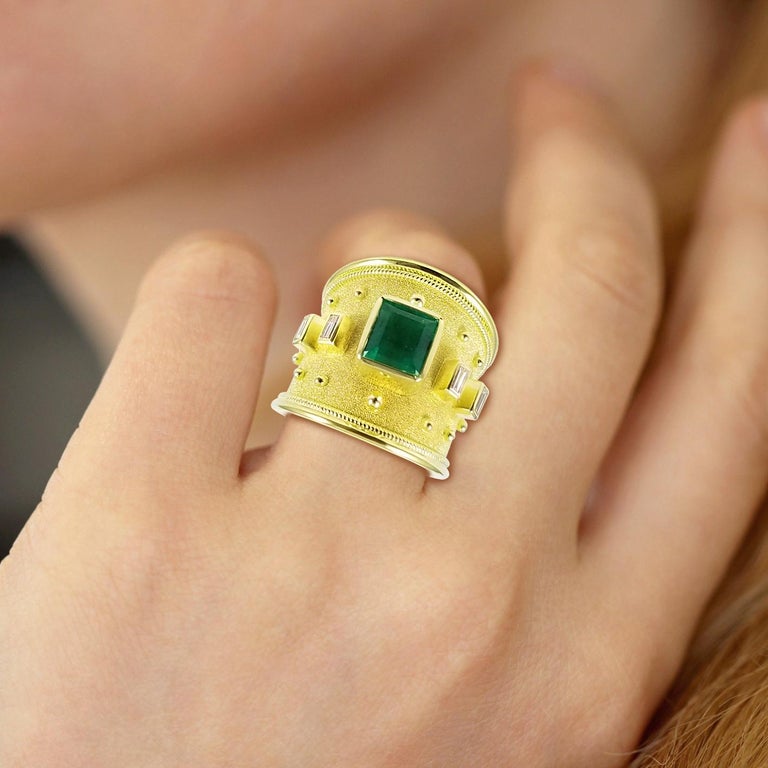 18 Karat Yellow Gold Emerald Ring and Emerald Cut Diamonds