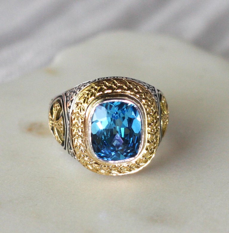 18 Karat Gold and Silver Cross Ring with Sky Blue Topaz