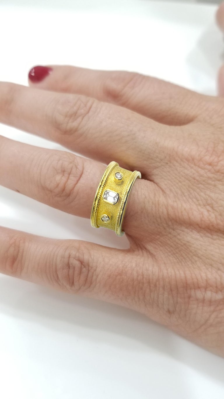 18 Karat Yellow Gold Diamond Band Ring Emerald Cut Diamond