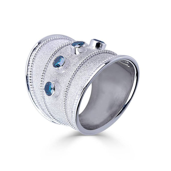 18 Karat White Gold Granulated Band Ring with Blue Diamonds