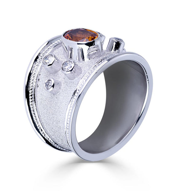18 Karat White Gold Diamond Band Ring with Orange Sapphire