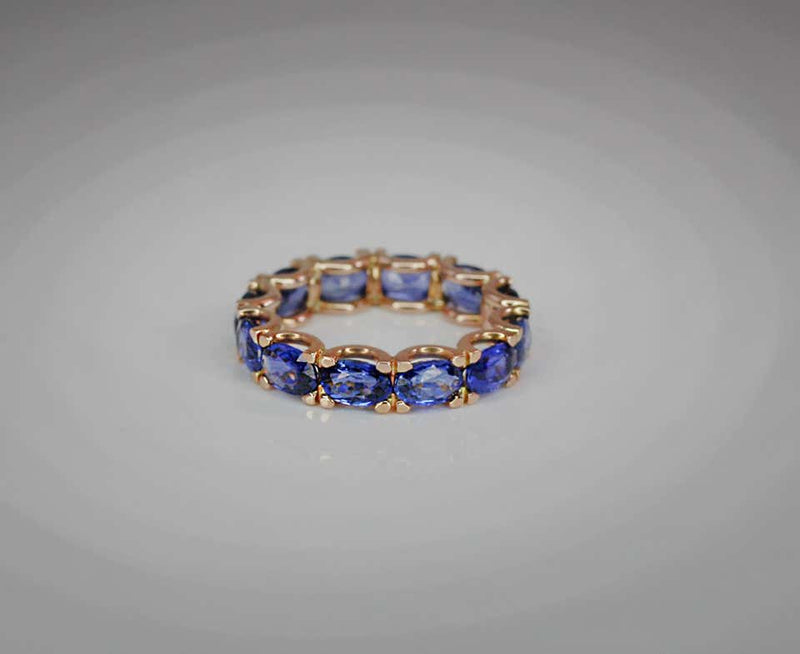 18 Karat Rose Gold Natural Blue Sapphire Eternity Band Ring