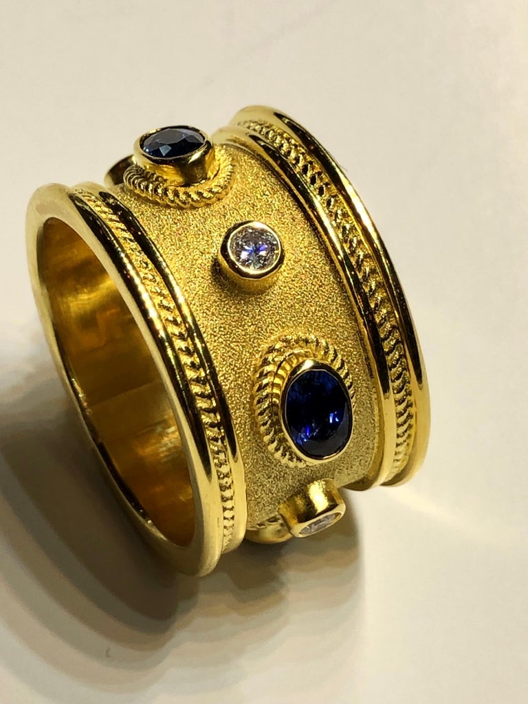 18 Karat Yellow Gold Diamond and 1.30 Carat Sapphire Ring