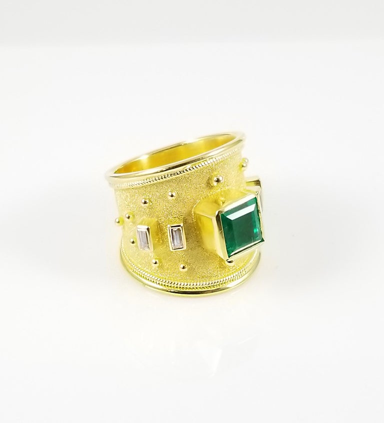 18 Karat Yellow Gold Emerald Ring and Emerald Cut Diamonds