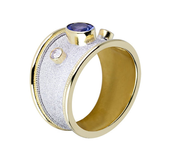 18 Karat White Gold Tanzanite and Diamond Band Ring