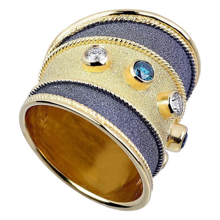 18 Karat Yellow Black Gold Ring with Blue White Diamonds
