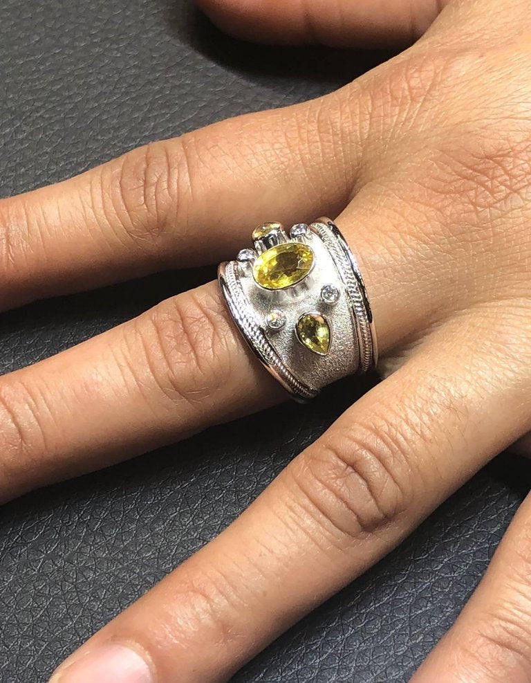 18 Karat White Gold Diamond Ring with Olive Green Sapphires