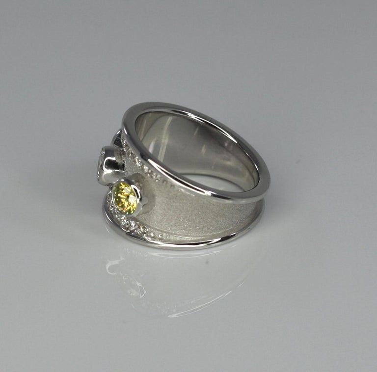 18 Karat White Gold Ring with Yellow Blue White Diamond