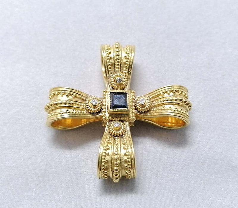 18 Karat Yellow Gold Diamond Emerald and Sapphire Cross